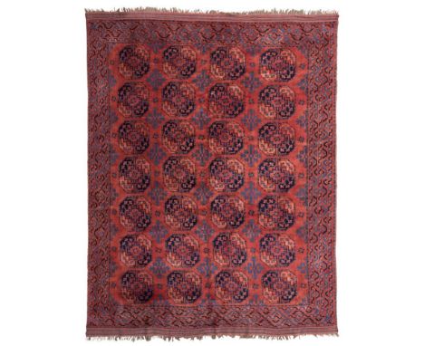 AFGHAN CARPET  MODERN   the rust brown field with four columns of seven guls, within multiple borders  312cm x 250cm