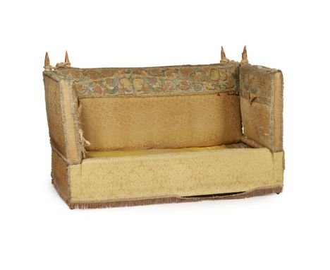 KNOLE SOFA  19TH CENTURY   of typical form, covered in distressed foliate cream silk with needlework panel overlay and tassel