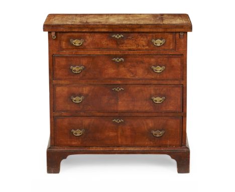 GEORGE II WALNUT BACHELOR'S CHEST  MID 18TH CENTURY   the crossbanded fold-over top with a moulded edge over four long drawer