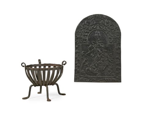 CAST IRON FIRE BACK AND DOG GRATE  18TH CENTURY   the arched back cast with a scene with two figures in a floral border and f