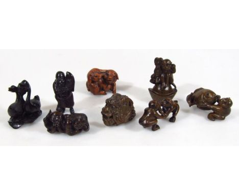 Various carved wooden netsuke, probably early 20thC and later, to include monkey group 7cm high, a further pair of carved mon