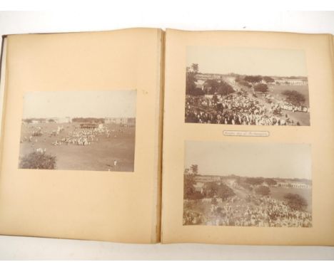 A circa late 19th Century photograph album containing approximately 18 albumen print and other photographs of India, in the h