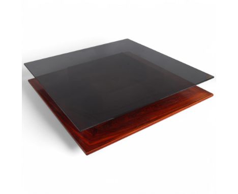 A 1960s'/70s' Danish rosewood coffee table by Mobelintarsia, with smoked glass top over brutalist copper insert centre panel 