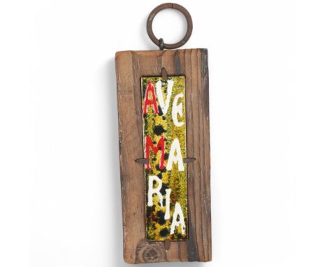 An American folk art ceramic plaque in recessed driftwood frame, painted overglaze "Ave Maria", frame 26 x 11cmPurchased by v