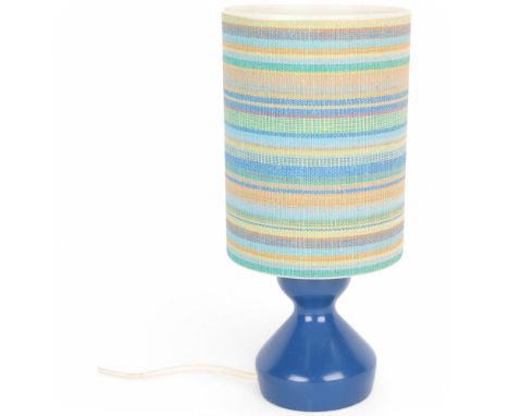 A mid 20th century Swedish blue wood lamp with fabric covered plastic shade, makers mark to base, height 25cmUntested good co