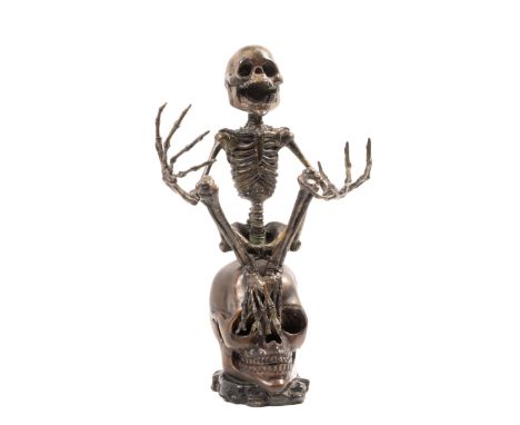 H.K. (Contemporary)Skeleton seated atop a large skullBronze, inscribed with initials to reverse, 550 x 330 x 300 mm (21 5/8 x
