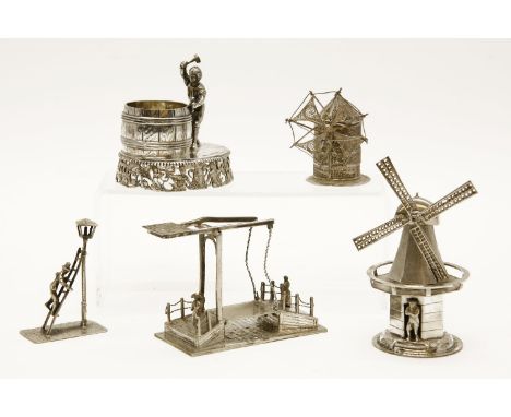 A miniature silver model of a lamp lighter and a drawbridge, two miniature silver windmills, and a vesta holder in the form o