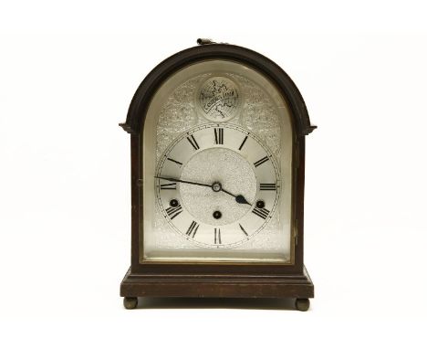 A 20th century mahogany cased domed Westminster chiming mantel clock, 32cm high and a Chinese lacquered games box