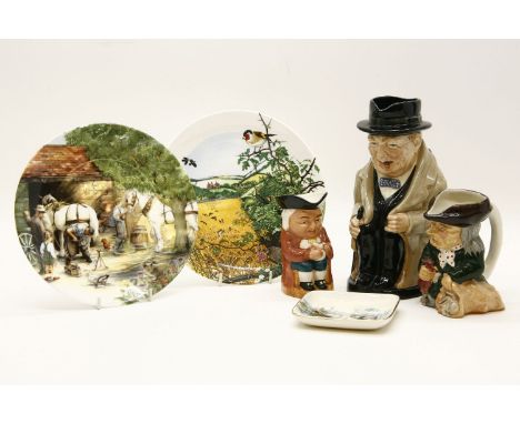 A collection of Toby Jugs to include Staffordshire examples, a large Royal Doulton example modelled as Winston Churchill, Goe