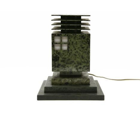 A toleware table lamp in the form of a Japanese lantern, on a wooden plinth, 33cm high