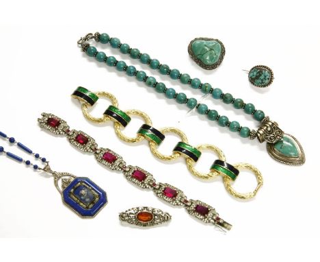 A collection of costume jewellery, to include a silver red paste stone brooch, a native American silver and turquoise pendant