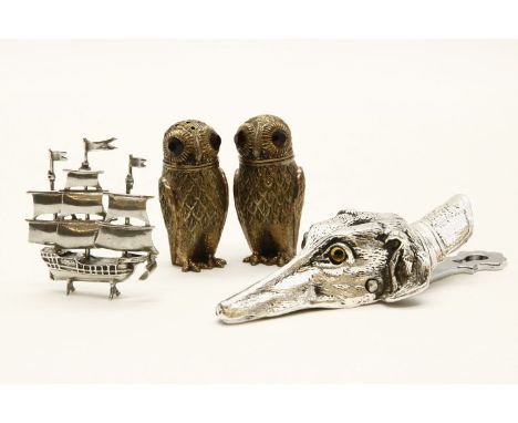 A Continental novelty silver salt & pepper, in the form of owls, together with a model ship, and a dog's head paperclip