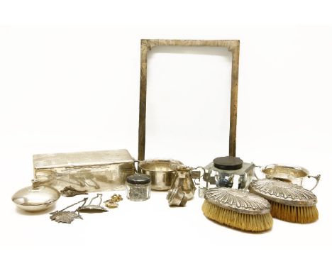 Various silver items, including: a photo frame, cigarette box, inkwell, cup, bottles etc.