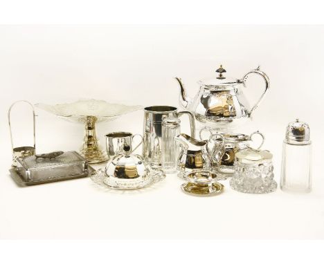 A quantity of silver plate to include an oak canteen of cutlery, and three piece tea set, coasters, a toast rack etc