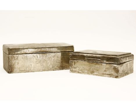 An engine turned cigarette box, and another