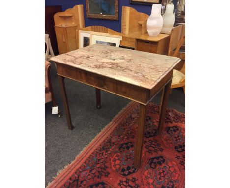 A mahogany console table, the marble top with a moulded edge, over a plain frieze, a side drawer raised on moulded supports,9