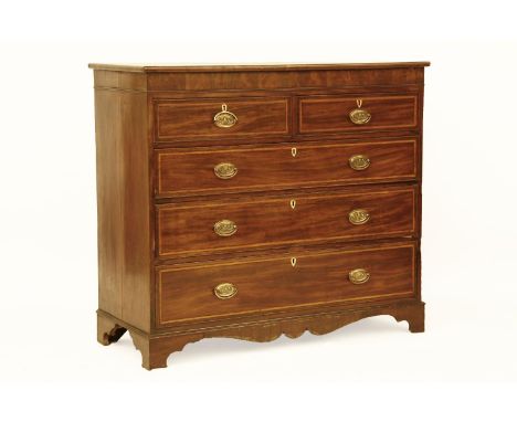 A George III inlaid mahogany chest of two short above three long drawers, on bracket feet, 123 cm x 54 cm x 110 cm