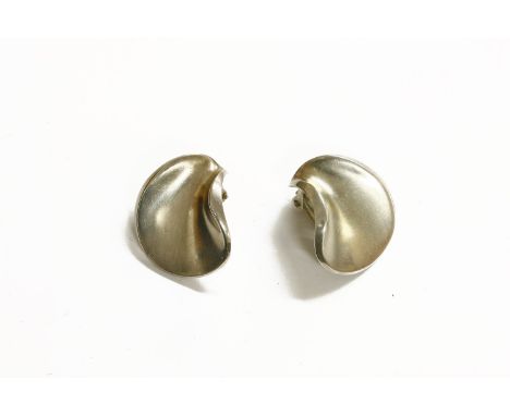 A pair of earrings by Georg Jensen, of pinched circular form with a fine silk finish and cup fittings, No. 925, import hallma