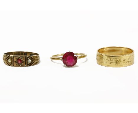 A single stone synthetic ruby ring, stamped 18ct, tested as approximately 18ct gold and an Italian wedding ring, with engrave