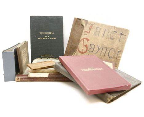 A box of folding maps, sketch books and scrap books