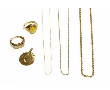 A gold rope link chain marked 375, a gold fine trace chain and another, together with a 9ct gold single stone yellow cabochon