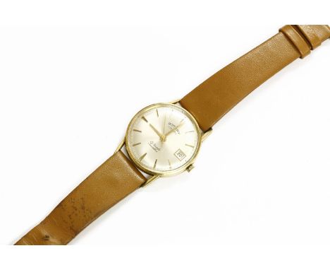 A 9ct gold gentleman's Rotary mechanical strap watch, with a silvered dial, raised gilt batons and hands, date aperture and c