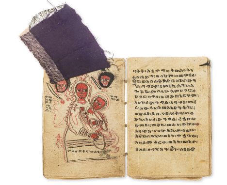 Ethiopic Manuscript.- [Prayer book], manuscript on vellum, 110pp. (the last 2 blank), written in black and red ink, decorativ