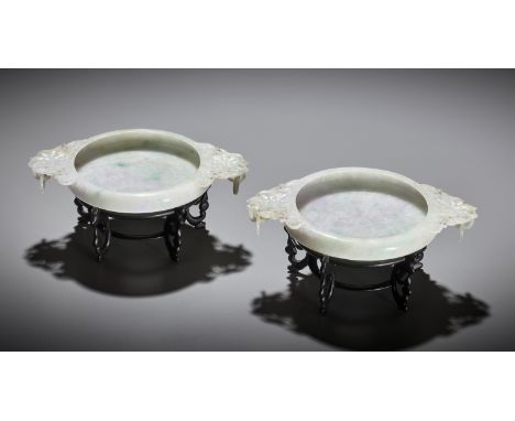 A PAIR OF RARE MUGHAL-STYLE JADEITE MARRIAGE BOWLS, LATE QING DYNASTYChina, 19th century. The bowls well carved with elegantl