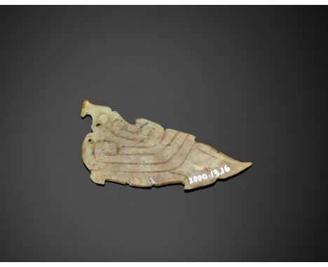 A CELADON JADE 'BIRD' PENDANT, MID-WESTERN ZHOU DYNASTYChina, circa mid-10th to mid-9th century BC. The bird has a flattened,