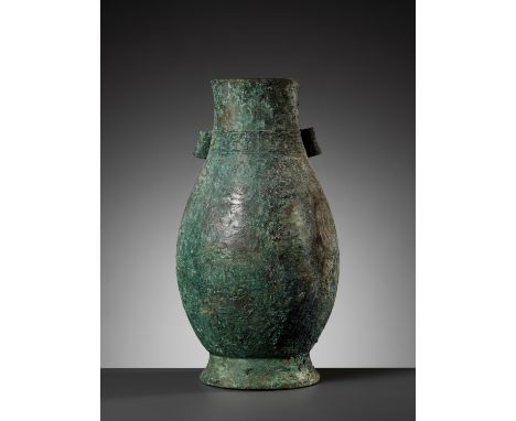 A RARE ARCHAIC BRONZE RITUAL WINE VESSEL, HU, MIDDLE WESTERN ZHOU DYNASTYExpert's note: This vessel comes in a 100% untreated