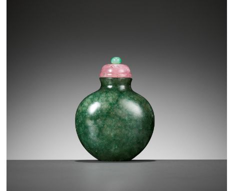 A VERY FINE AND RARE MOTTLED EMERALD-GREEN JADEITE SNUFF BOTTLE, 1780-1880China. Well hollowed, of flattened globular form wi