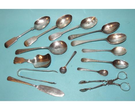 A pair of silver sugar nips, a pair of silver sugar tongs, various silver spoons and a plated caddy spoon, silver weight ___5