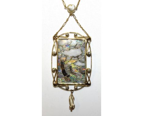 An Arts &amp; Crafts pendant in the manner of Archibald Knox, of rectangular form inlaid with opal and hardstone mosaic and d