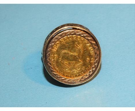 A 1982 1/10 krugerrand coin in 9ct gold ring mount, size M, 6.8g. 