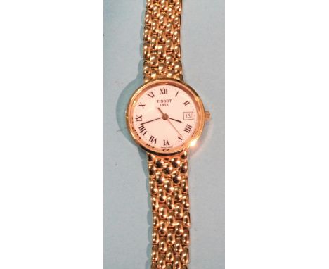 Tissot, a ladies' 18ct yellow gold wrist watch, the white enamel dial with Roman numerals and date aperture, marked Tissot 18