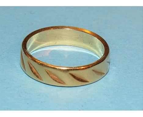 An 18ct yellow gold wedding band, size K, 3.9g. 