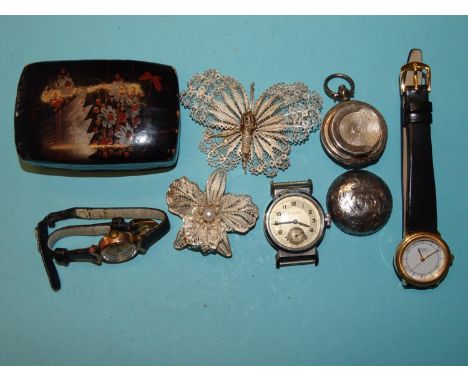 A Movado steel-cased wrist watch, (not working), a ladies' gold-plated Tissot wrist watch, a silver sovereign case (a/f), two