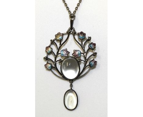 An Art Nouveau silver pendant collet-set an oval moonstone within a wreath of small blue and purple enamelled leaves, with sm