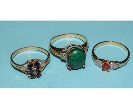 A 9ct gold ring set fire opal&nbsp;and six diamond points, a 9ct gold ring set malachite and a 9ct gold ring set a rectangula