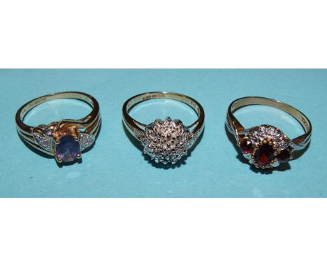 Three 9ct gold cluster rings set diamond points and other gems, sizes M-P, 8.3g. 