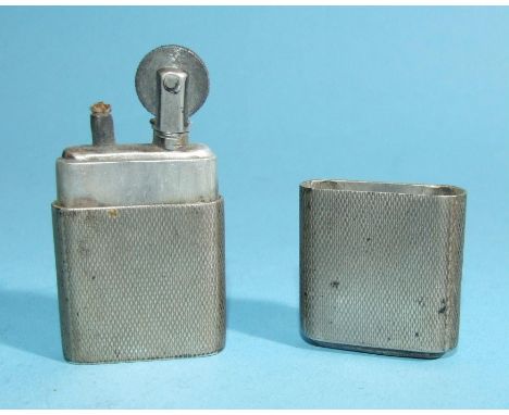 The "Howitt" silver cigarette lighter by Dudley Russell Howitt, with overall engine-turned decoration, Sheffield 1944, 6 x 3c