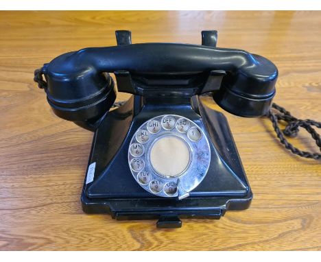 Vintage black Bakelite GPO rotary telephone no. 164 in good working order, dialling and receiving calls, no bell box.