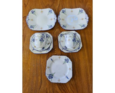 Shelley Blue Iris part teaset comprising 2 cake plates, 6 tea plates, 4 cups and 4 saucers.