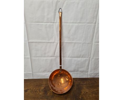 Large copper ladle with 7.3/4" diameter bowl.
