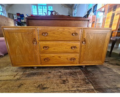 Ercol model 455 blonde Windsor sideboard, 61" long.