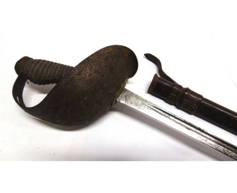 A BRITISH 1912 PATTERN CAVALRY OFFICER'S SWORD  by Wilkinson, the 89cm straight polished blade etched with the Royal arms, 'G