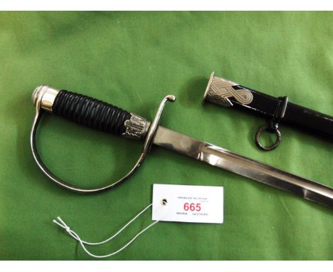 SCHUTZSTAFFEL (SS) - AN NCO'S SWORD DEGAN  by Paul Weyersberg & Co., Solingen, the 84cm single-edged blade bearing etched mak