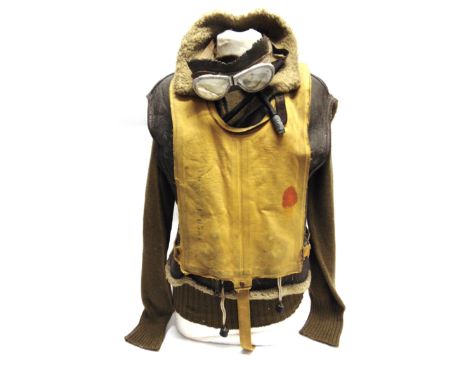 A SECOND WORLD WAR U.S. ARMY AIR FORCE FLYER'S UNIFORM  comprising sweater (O.D.), sheepskin flying jacket, the sleeves remov