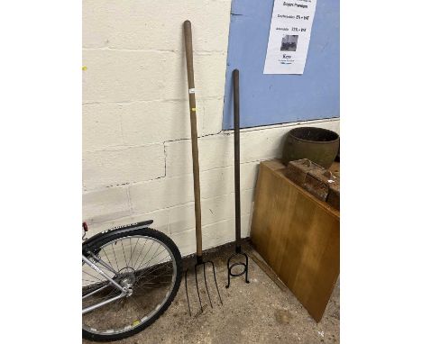 Two vintage hand tools, hay fork plus one other