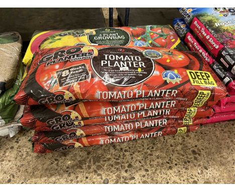 Five bags of Grow More tomato planter bags